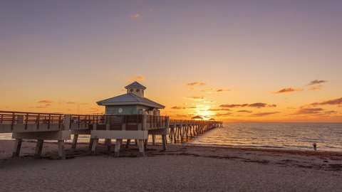 Juno, Florida, USA at the Juno Beach Pier just before sunrise.