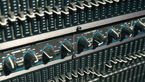 The graphic equalizer and power amplifier are in the rack stack, in the recording studio. - Powered by Shutterstock - Get 15% off with code: PIKWIZARD15