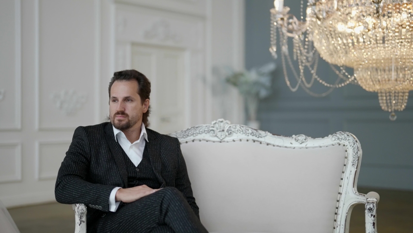 wedding day, man and his beautiful bride in luxury apartment, preparing to ceremony