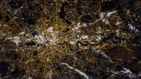 London city satellite view by night with . Contains public domain image by Nasa, London view from space at night