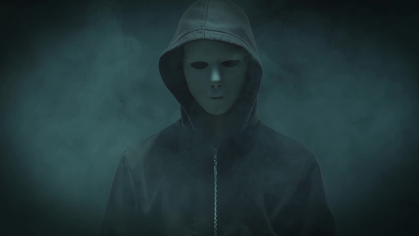 Portrait of computer hacker in hoodie. Obscured dark face. Data thief, internet fraud, darknet and cyber security. Royalty-Free Stock Footage #1082297248