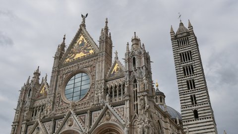 Siena, Tuscany, Italy JULY, 15, 2016 Facade of the Cathedral of Siena. Top bottom 4K high quality tilt video