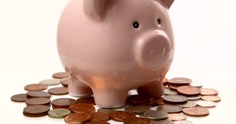 Piggy Bank Rotating on Pennies