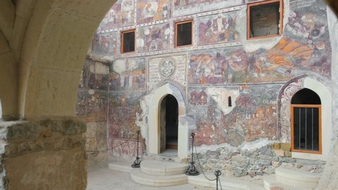 Ancient christian frescoes inside the Rock Church at Sumela Monastery in Trabzon, Turkey. Steadicam shot