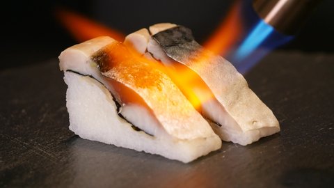 Japanese mackerel sushi. Roasting video.