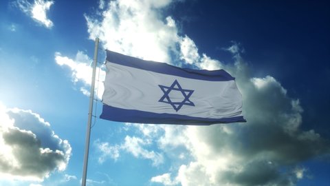 Flag of Israel waving at wind against beautiful blue sky