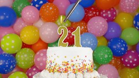 Birthday cake with candles number 21. Cake on a bright festive background of colorful balloons. - Powered by Shutterstock - Get 15% off with code: PIKWIZARD15