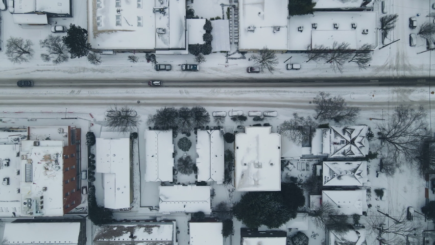 Snowy winter streets in Oregon. Panning over snow covered neighborhoods. . High quality 4k footage