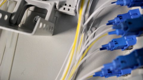 Telecommunication equipment of network cables in a datacenter of mobile operator.ODF panels and boxes. Optical patch panels and boxes for welding ODF