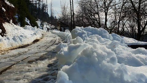 Kupwara Jammu and Kashmir India 06 11 2021. Fresh snow fall in kashmir parts looks beautiful. Winter shines hills and trees with snow.