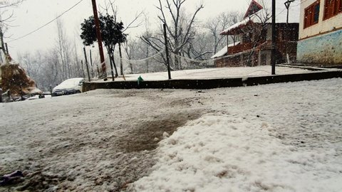 Kupwara Jammu and Kashmir India 06 11 2021. Fresh snow fall in kashmir parts looks beautiful. Winter shines hills and trees with snow.
