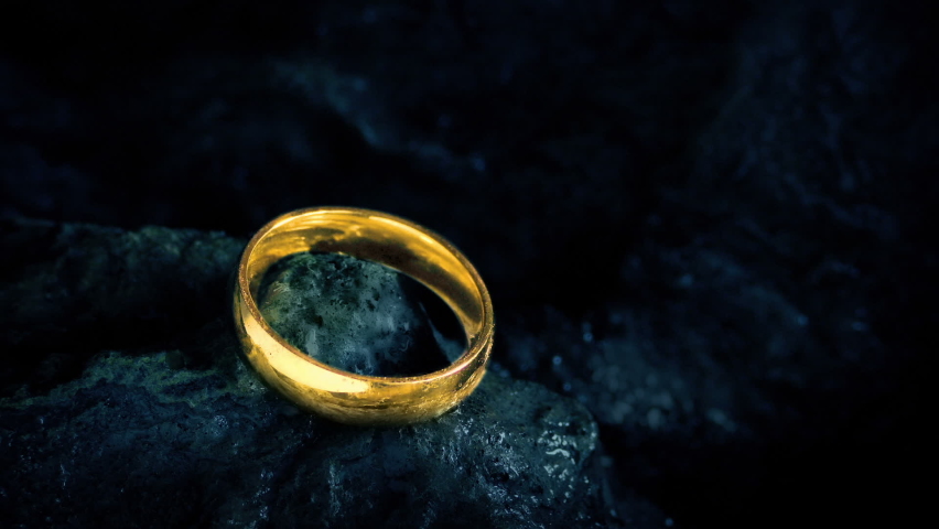 Gold Ring Picked Up And Falling On Rocks Royalty-Free Stock Footage #1082421406