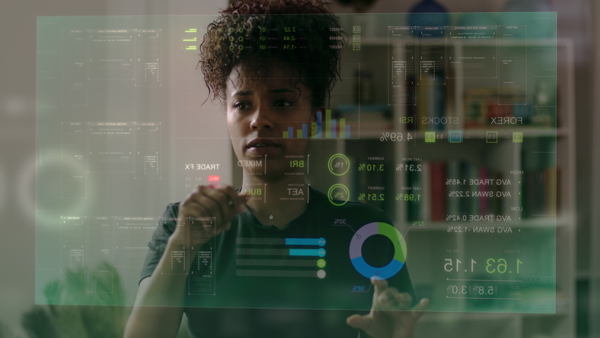 Pretty African American Business Woman Using Virtual Reality to Check 
Economic Data. Young Girl Using VR or Working In Augmented Reality at Workplace. Finance Holographic Animations Royalty-Free Stock Footage #1082422948