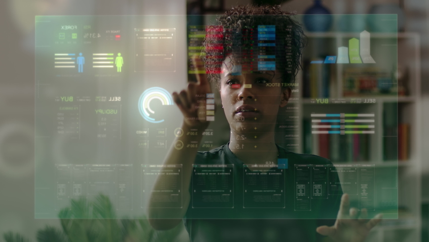 Pretty African American Business Woman Using Virtual Reality to Check 
Economic Data. Young Black Girl Using VR or Working In Augmented Reality at Workplace. Finance Holographic Animations | Shutterstock HD Video #1082422948