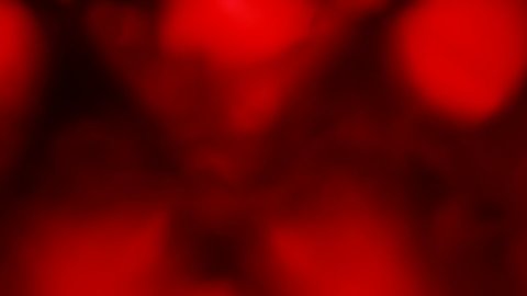 Abstract glowing festive background red on black, bokeh, blood, fire, love. Background video, copyspace. Abstract red fractal composition. 