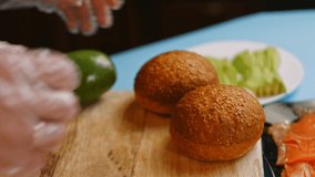 Prepare Smoked Salmon Bagel. I cook bread for the burger. 4k video