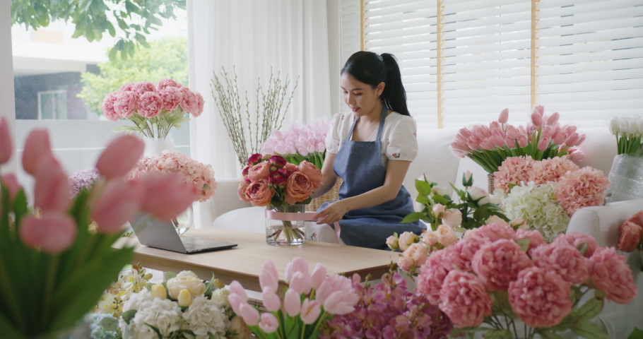 Asia people SME woman tied bow sell flower gift product wrap parcel send by same day sale order fulfilment dropshipping postal solution. Happy job work at home business workspace in digital store. | Shutterstock HD Video #1082445598