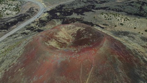Cinder Cone Volcano, St George, Utah, Stunning drone shot of one of the cinder cone's in Washington County. The smaller cinder cone lies one mile north of the Cinder Cone. With roads and cars.