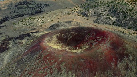 Cinder Cone Volcano, St George, Utah, Drone shot of one of the red and green cinder cone's in Washington County. The smaller cinder cone lies one mile north of the Cinder Cone Trail on State Route 18