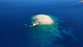Aerial drone video of shipwreck ship sunk near shore in Mediterranean sea