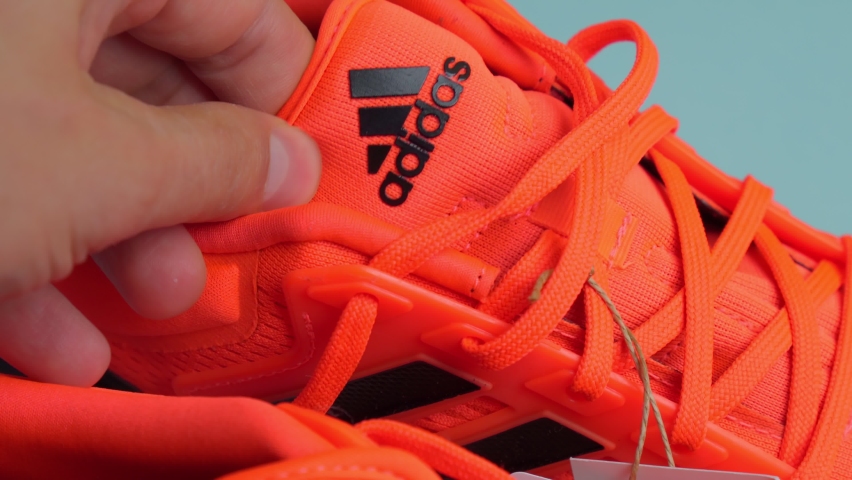 orange adidas logo