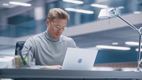 360 Degree Modern Office: Businessman Sitting at His Desk Working on a Laptop Computer. Digital Entrepreneur working with Big Data e-Commerce Project, Successful Startup. Tracking Moving Around Shot - Powered by Shutterstock - Get 15% off with code: PIKWIZARD15