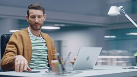 360 Degree Time-Lapse Office: Productive Caucasian Businessman Sitting at His Desk Working on a Computer. Digital Entrepreneur working with Big Data e-Commerce project. Moving Around Tracking Shot - Powered by Shutterstock - Get 15% off with code: PIKWIZARD15