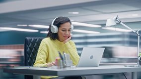 360 Degree Time-Lapse Office: Productive Latin Businesswoman Sitting at Her Desk Working on a Laptop Computer. Smiling Successful Hispanic Woman working. Energetic Moving Around Tracking Shot - Powered by Shutterstock - Get 15% off with code: PIKWIZARD15