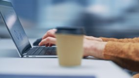 360 Degree Modern Office: Portrait Businessman Sitting at His Desk Working on a Laptop Computer. Man working with Big Digital Data e-Commerce. Tracking Shot From Hands to Face. Camera Moving Around - Powered by Shutterstock - Get 15% off with code: PIKWIZARD15