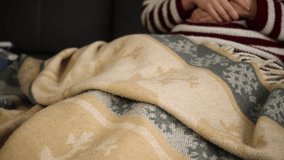 Woman take the warm blanket to keep the cozy. Relax at winter holidays, christmas and new year concept video