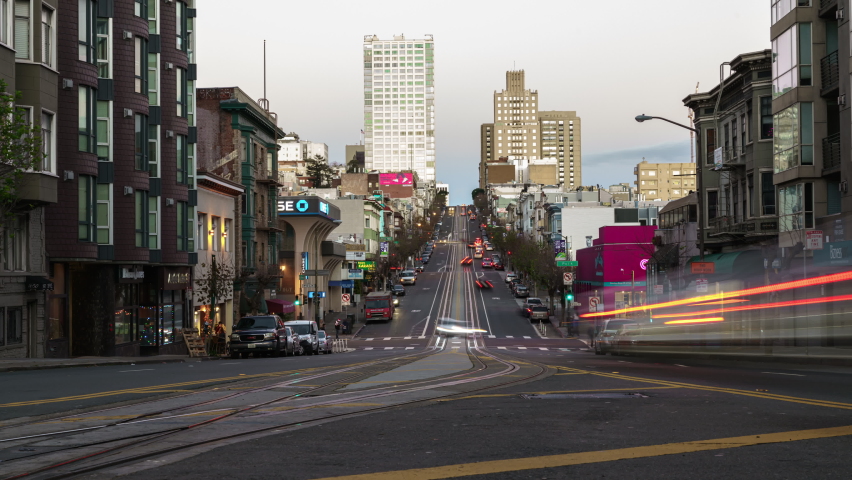 Time lapse day to night motion tracking shot of California Street in San Francisco