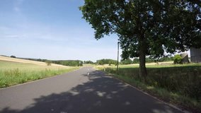 POV Driving on a country road - Drivers View. 4K Video Clip. Filmed in Germany.