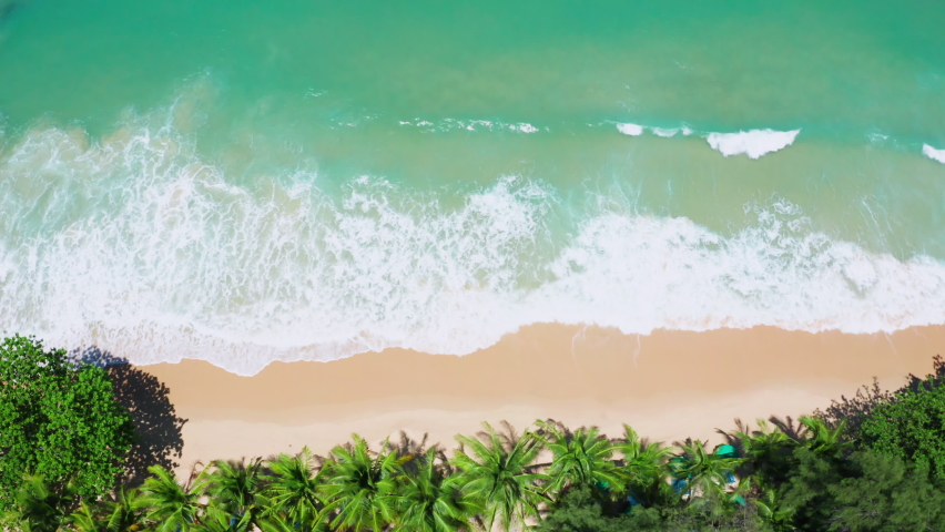 4K Aerial drone top view crowd of people at tropical Beach with sunset in Phuket, Thailand, Beautiful Phuket beach is famous tourist destination at Andaman sea. Top view happy people play on the beach | Shutterstock HD Video #1082519167