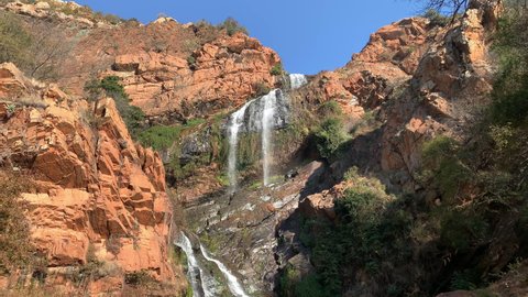Krugersdorp, South Africa - 22nd June 2021: Water fall at National Botanical Garden 