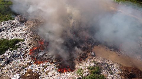 Drone footage of fire at garbage dump. Problem of polluting environment