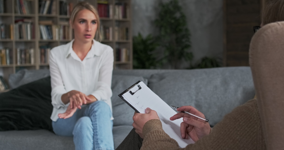Female visited family lawyer talking problem financial justice process or divorce. Male jurist working with client listening analyzing noticing. Appointment with advisor mortgage document consulting | Shutterstock HD Video #1082534707