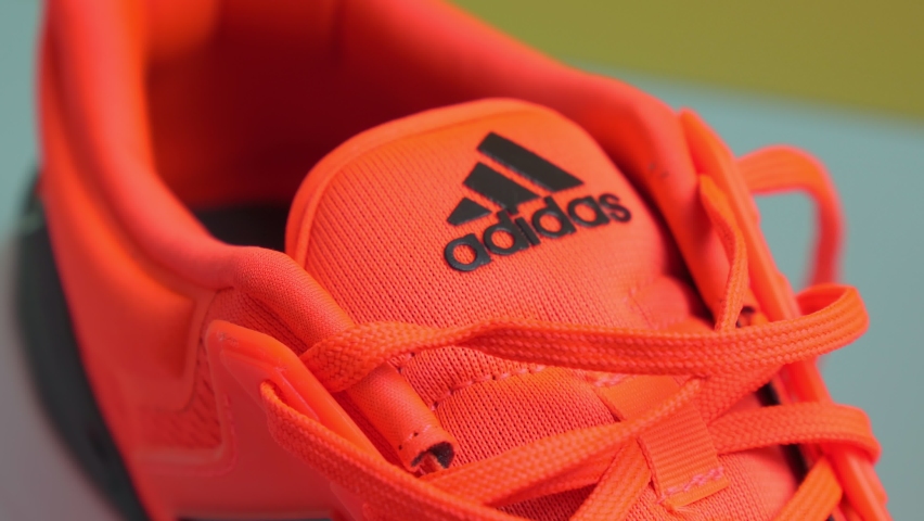 orange adidas logo