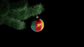 New Year's ball with the flag of Cameroon on a Christmas tree branch in looped animation on a transparent background (alfa chanel). Christmas and New Year concept. - Powered by Shutterstock - Get 15% off with code: PIKWIZARD15