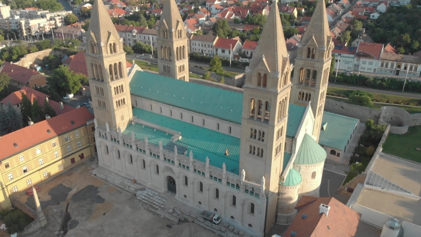 Cinematic 4K aerial drone footage of the Cathedral in Pécs in Southern Hungary, a major cultural center, on the slopes of the Mecsek mountains, administrative, economic center of Baranya County