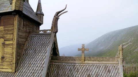 Wooden Roof Detail Of Lom Stave Church With Shingles And Dragon Head In Norway. Aerial Orbit
