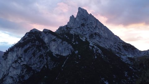 Dramatic Sunset Over Sass De Stria Mountain And Passo Falzarego (Falzarego Pass) In Veneto, Italy. drone pullback