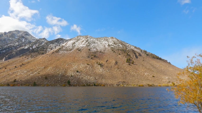 Snowy Sherwin Range mountains and the Convict Lake, in Mono, California - pan view
