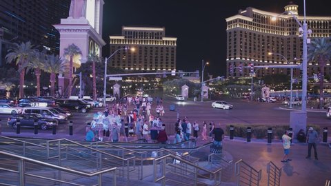 Las Vegas, Nevada - September 29, 2021: The busy streets of the Las Vegas Strip between Bellagio and Planet Hollywood hotel during late evenings. 