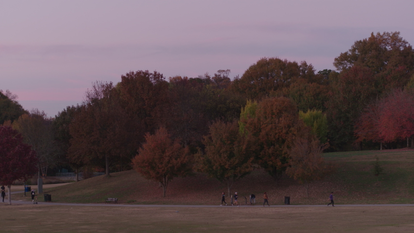 Aerial footage of Piedmont Park in Atlanta, GA.  The camera slowly rises to reveal Buckhead in the distance.