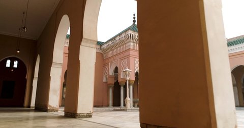 Kapurthala, Punjab - 11-12-2019 : Beautiful courtyard inside Moorish mosque in Kapurthala. Slider shot from behind the wall of moorish mosque courtyard.