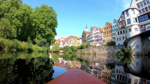 Time lapse footage of stand up paddle board (SUP) on the Neckar river along the picturesque old town of Tübingen in Southern Germany