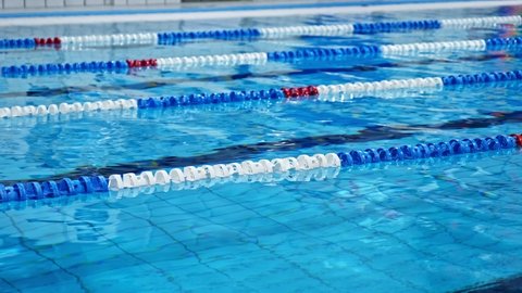 Swimming Pool Safety Buoyant Lane Ropes Floating on Water Surface