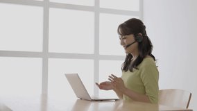 asian woman online meeting with virtual display technology concept