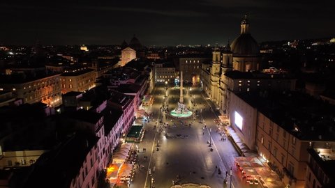 Rome at night. Piazza Navona with tourists and lights.
Aerial view, drone, aerial shots. Center city of Roma, Italy.