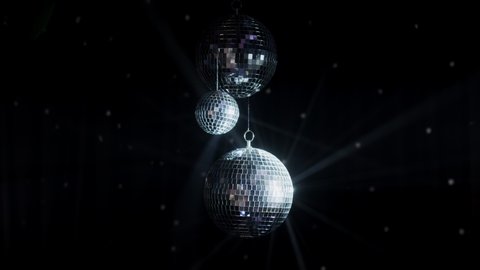 Disco Ball Mirrors Spin PAL. the ball spins and sparkles as it spins in a perfect loop. Loops smoothly. Disco mirror ball in the center of the smoke.
